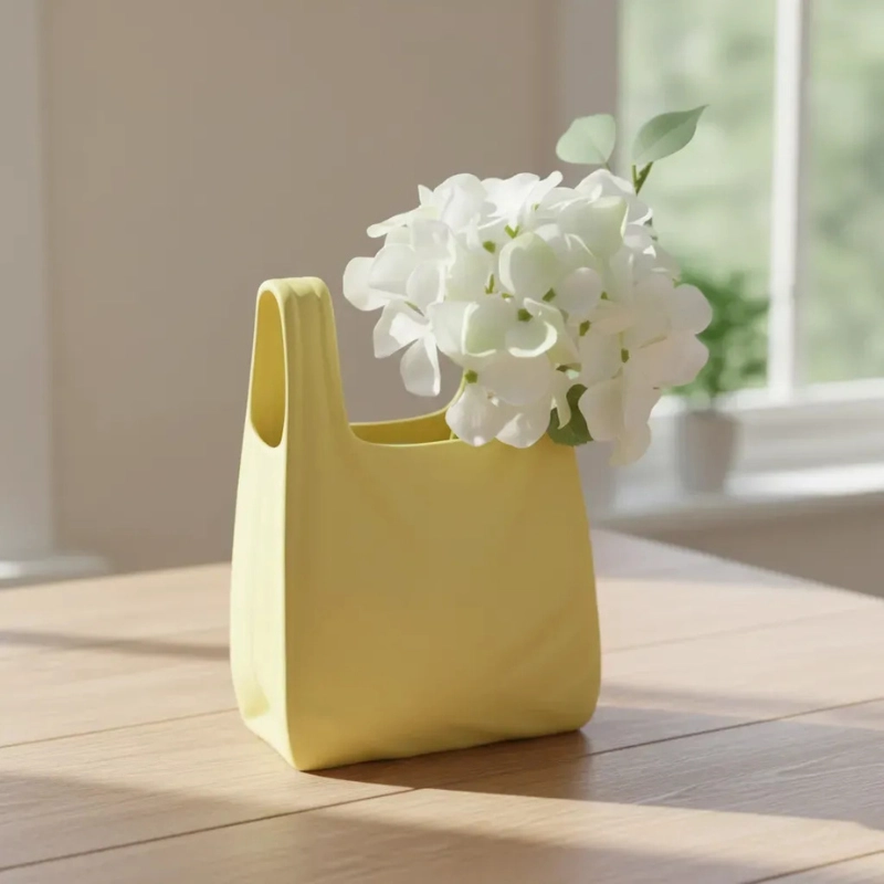 DECORACION ELEGANTE PRINTS PATRO - FLORERO ESTILO BOLSA DE PLASTICO AMARILLA - 2