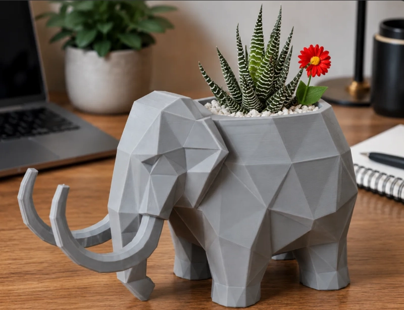 MACETERO DECORATIVO HOGAR- FORMA MAMUT 15 CM GRIS - 1