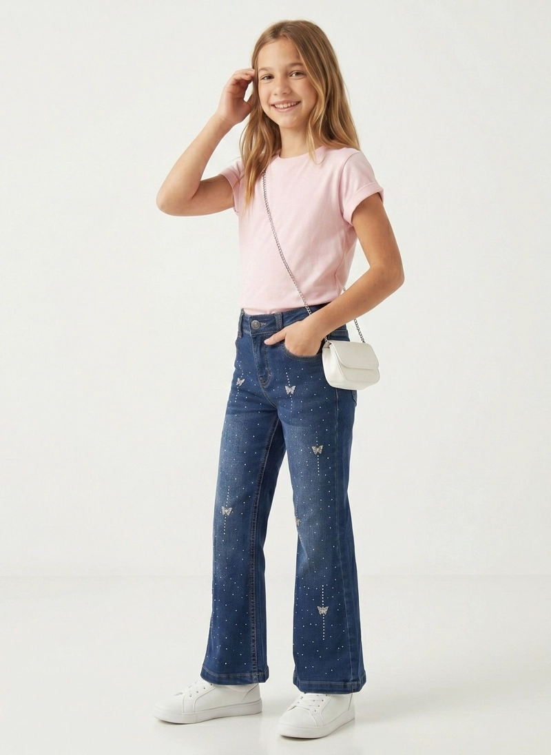 PANTALON MEZCLILLA NIÑA CORTE FLARE CON BRILLANTES CHIC - 1