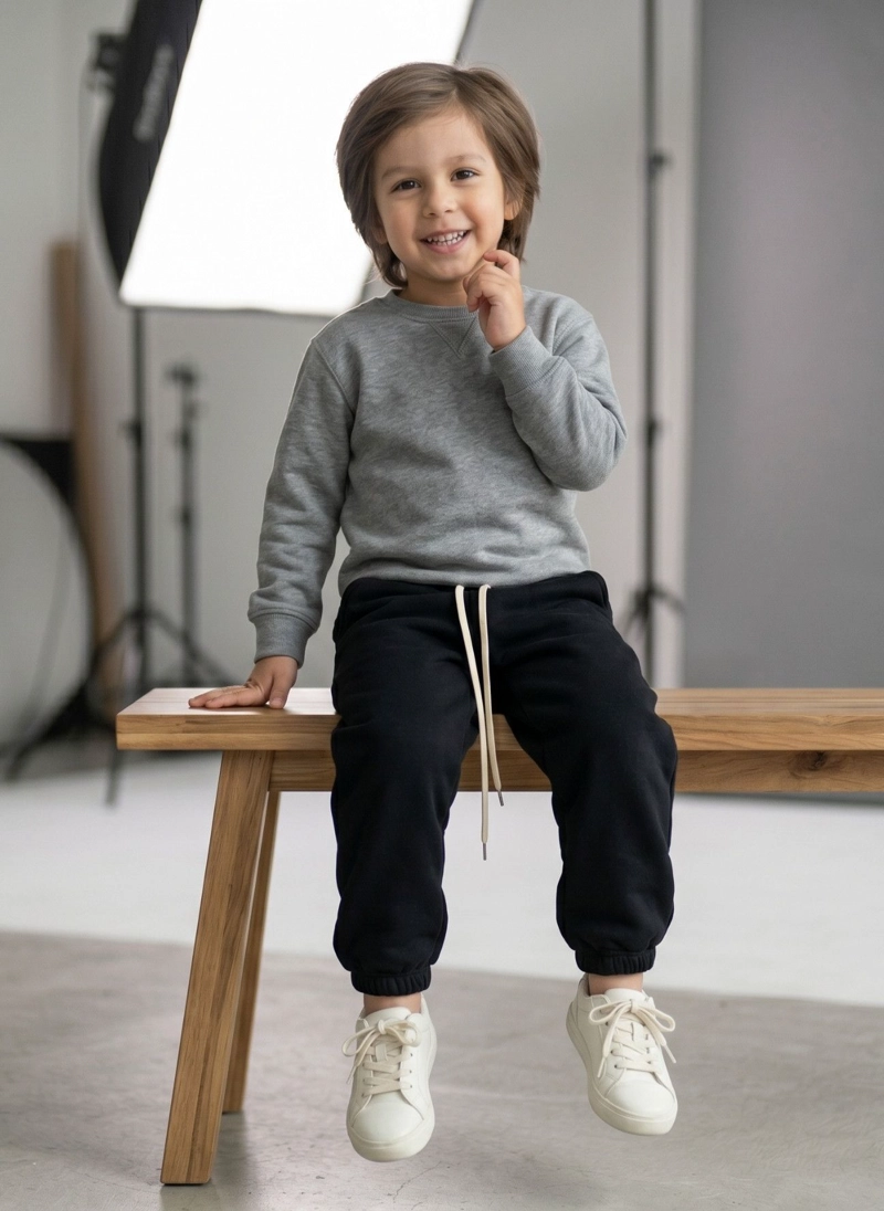 PANTALON BUZO NIÑO ALGODON JOGGER NEGRO CON PUÑO ESCOLAR - 4