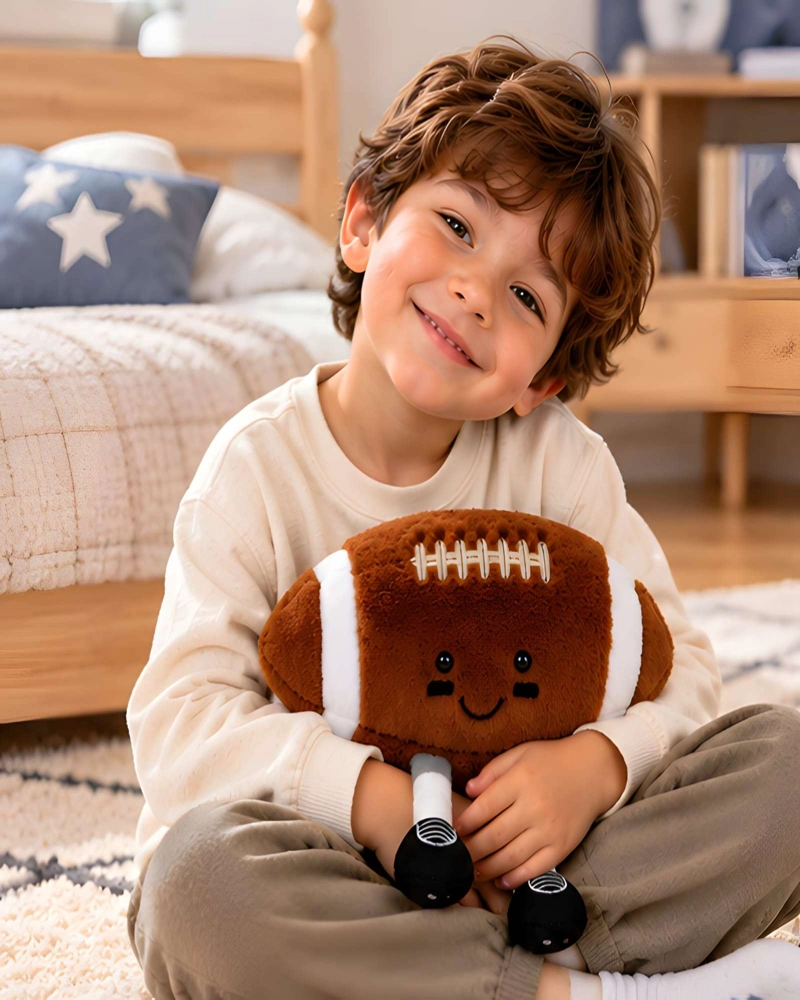 COJIN PELUCHE BALON FUTBOL AMERICANO CON PIERNAS PARA CUARTO INFANTIL - 4
