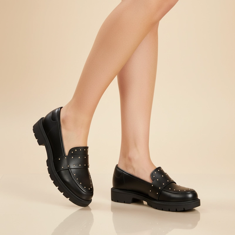 MOCASINES NEGROS CON TACHAS BEIRA RIO - 1