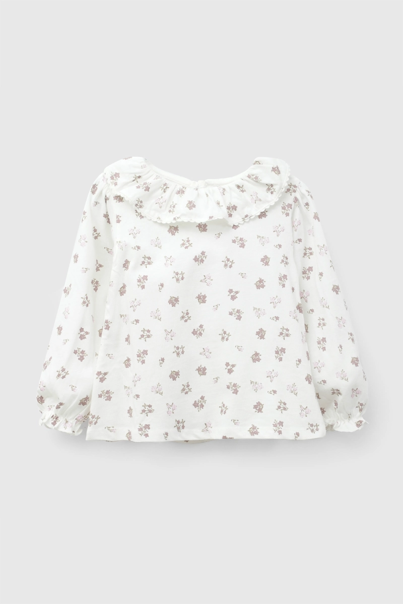 POLERA VUELOS FLORES BLANCO NIÑA 6-9M A 4-5A COLLOKY - 1