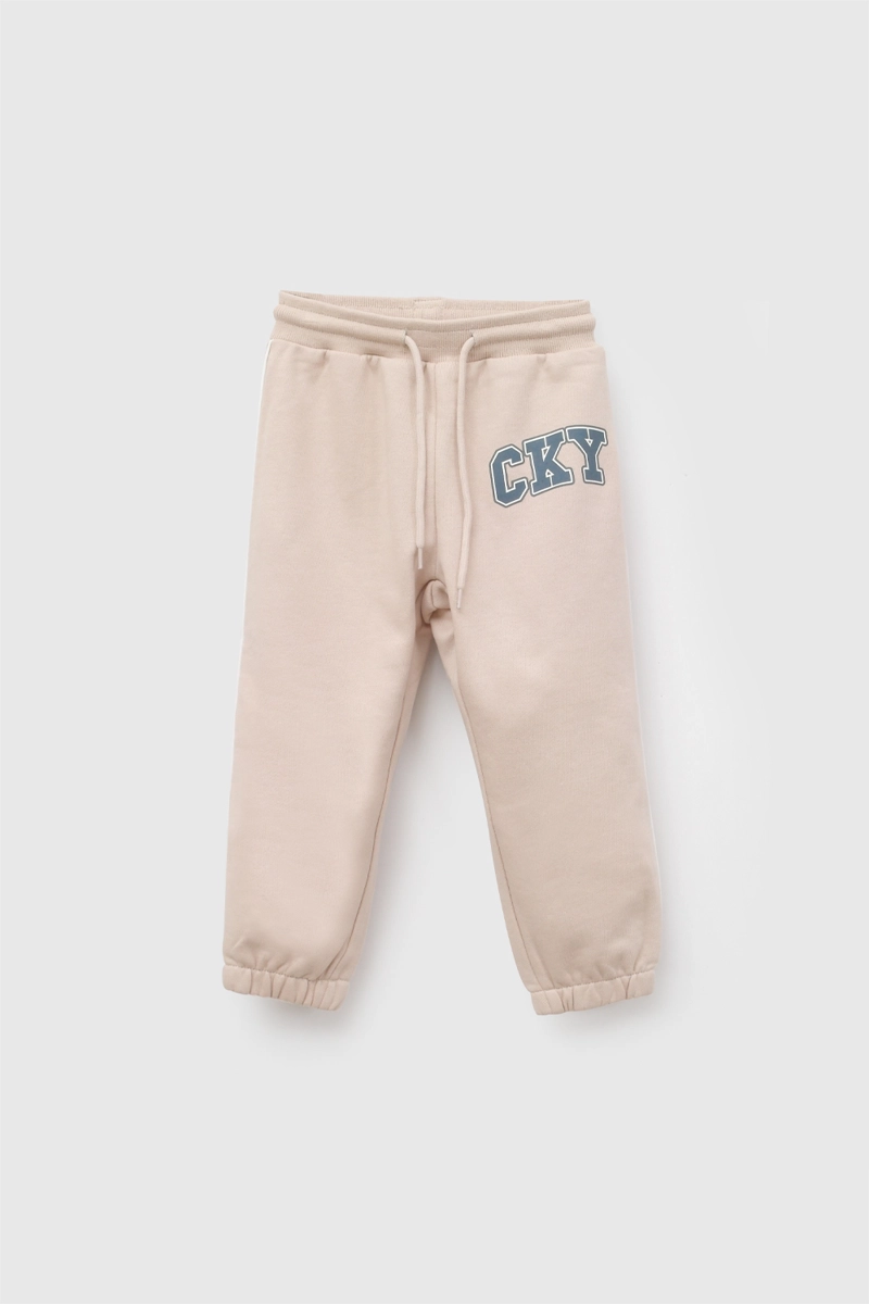 PANTALON BUZO CKY BEIGE NIÑO 6-9M A 4-5A COLLOKY - 1