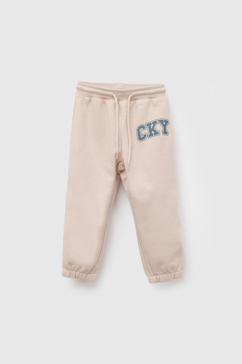 PANTALON BUZO CKY BEIGE NIÑO 6-9M A 4-5A COLLOKY - 1