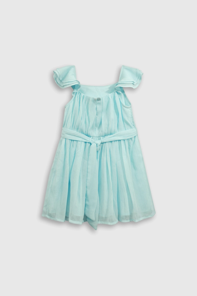 VESTIDO AMPLIO PUNTITOS METALIZADOS CELESTE BRILLO SOBRE RODILLA - 1