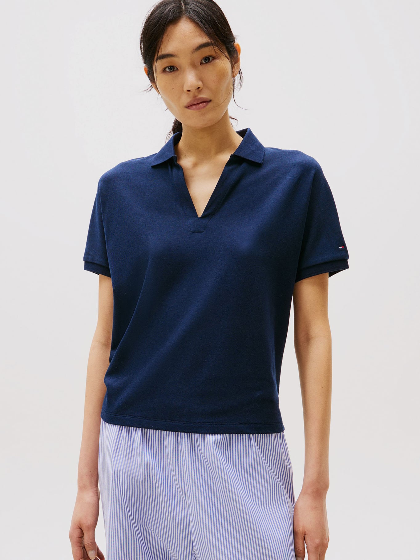 POLO SOLID CON LOGO RELAXED FIT - 1