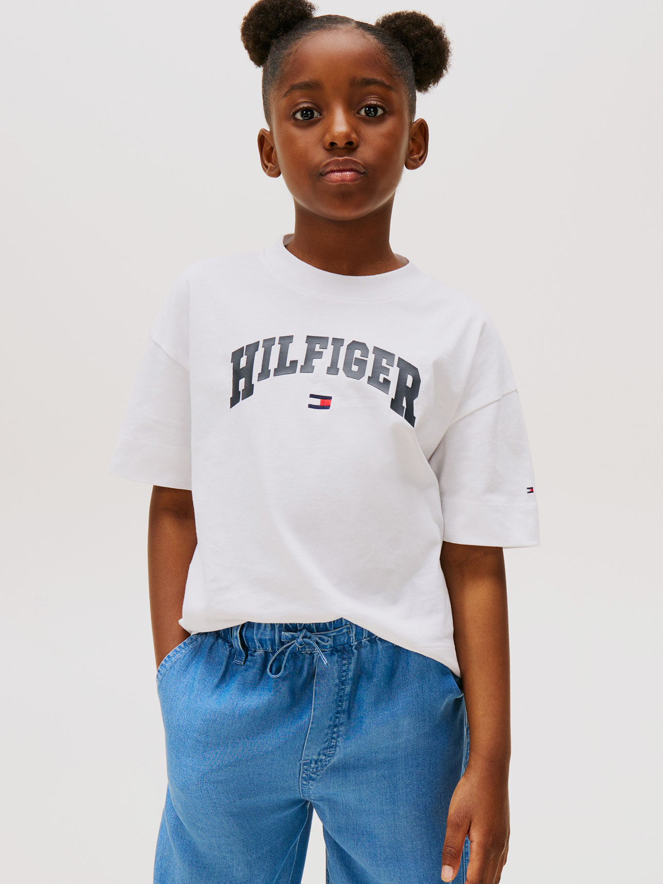 POLERA JASPEADA CON LOGO VARSITY - 1