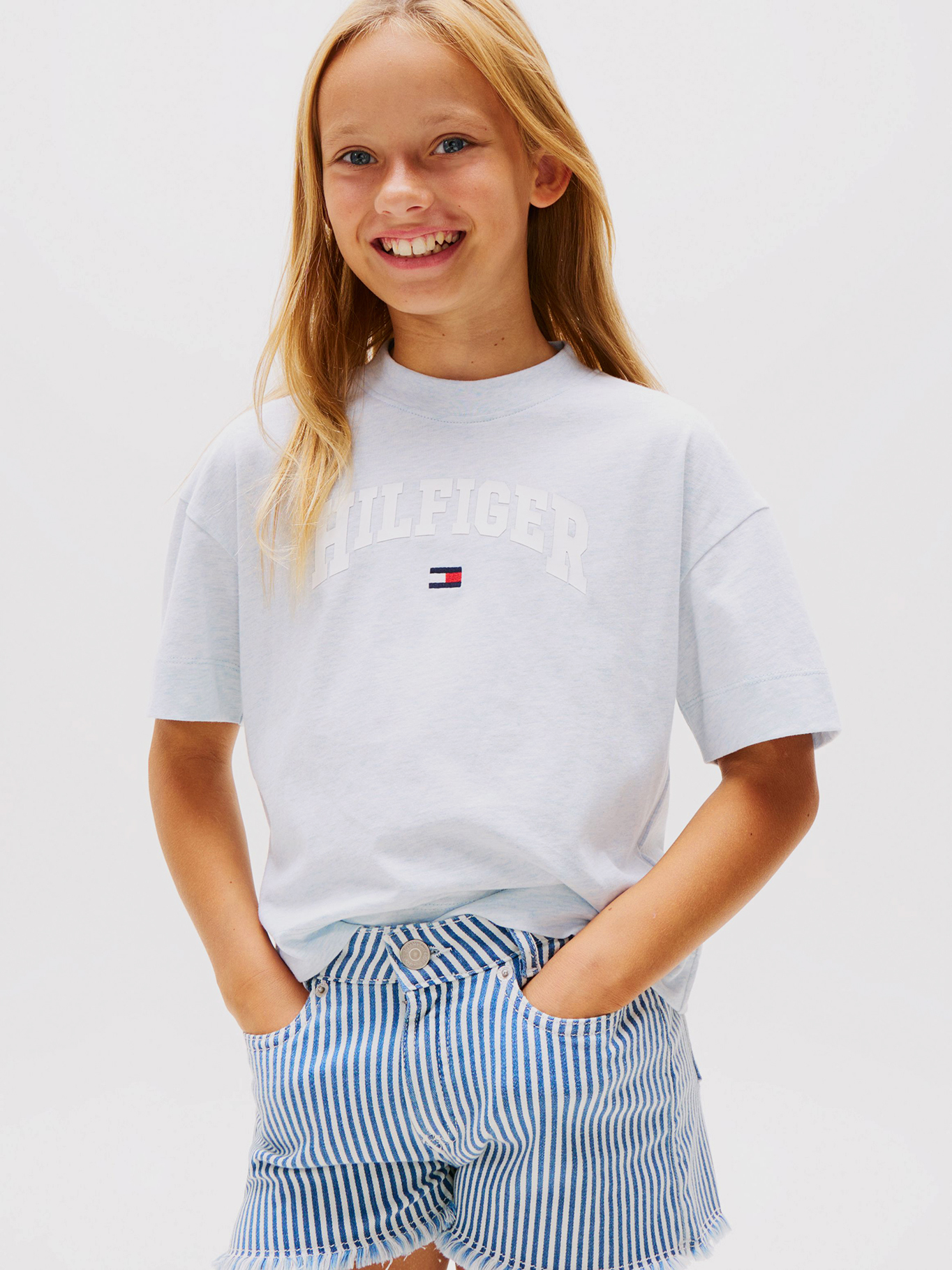 POLERA JASPEADA CON LOGO VARSITY - 1