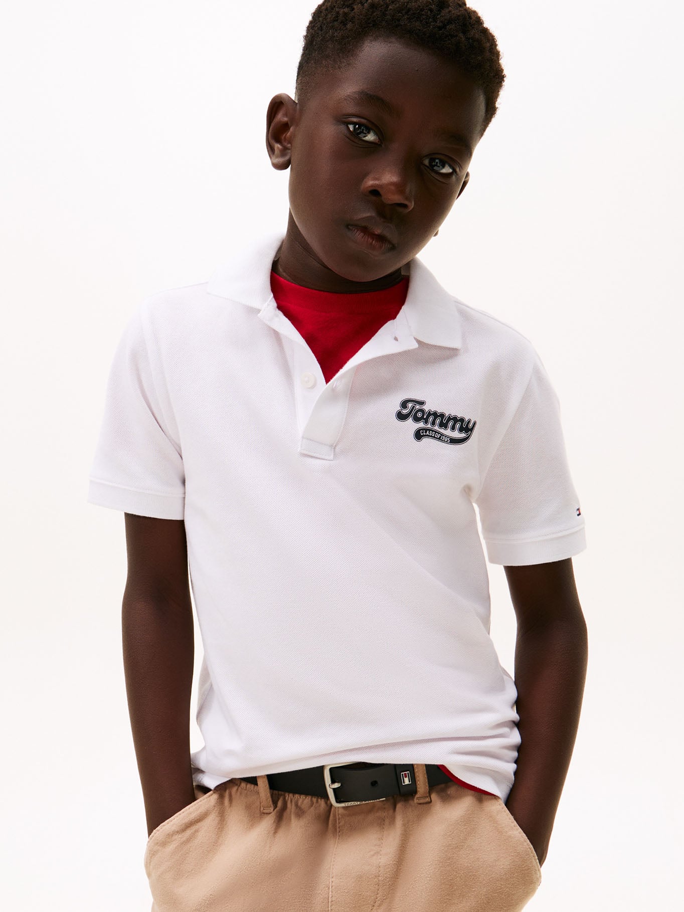 POLO VARSITY CON LOGO GRAFICO DE NIÑO - 1