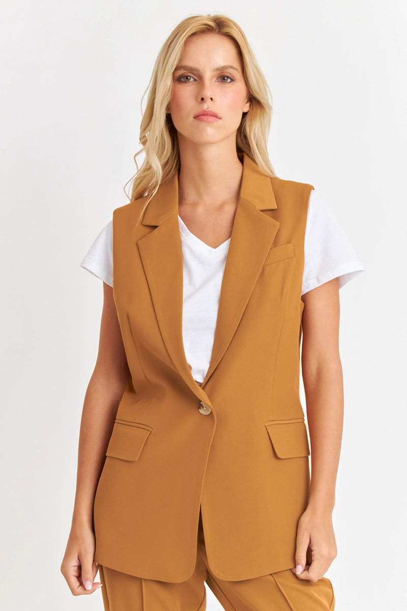 BLAZER SIN MANGAS BOTON LUCUMA NICOPOLY - 1