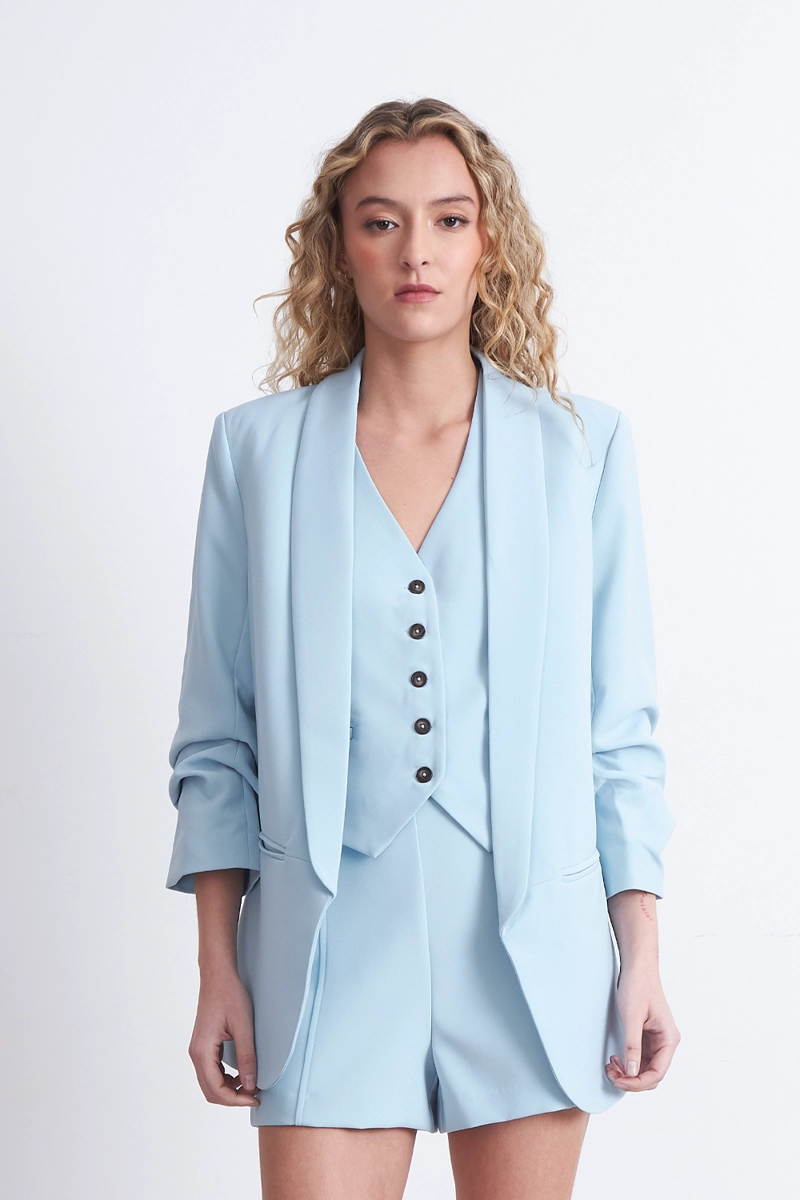 BLAZER MANGA 3/4 AJUSTADO CON SOLAPAS CELESTE MUJER NICOPOLY - 1