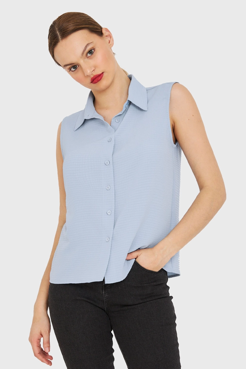 BLUSA SIN MANGAS CELESTE NICOPOLY - 1