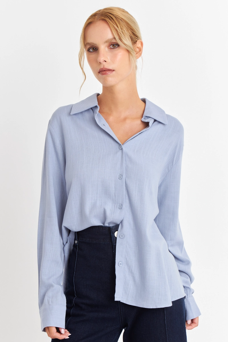 CAMISA BOTONERA ESPALDA CELESTE NICOPOLY - 1