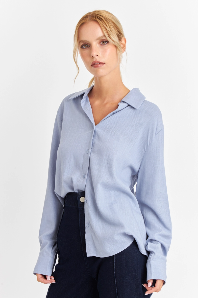 CAMISA BOTONERA ESPALDA CELESTE NICOPOLY - 5