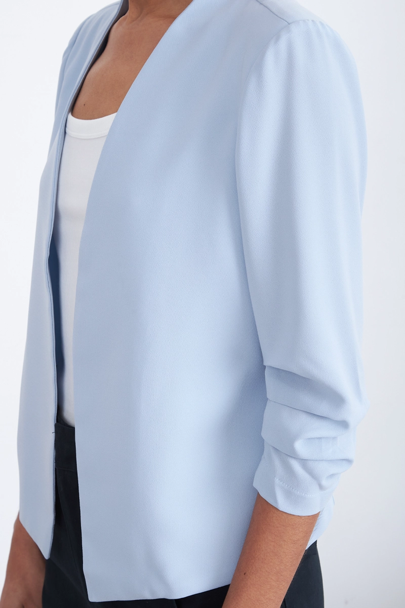 BLAZER CUELLO SIN SOLAPA CELESTE MUJER NICOPOLY - 7
