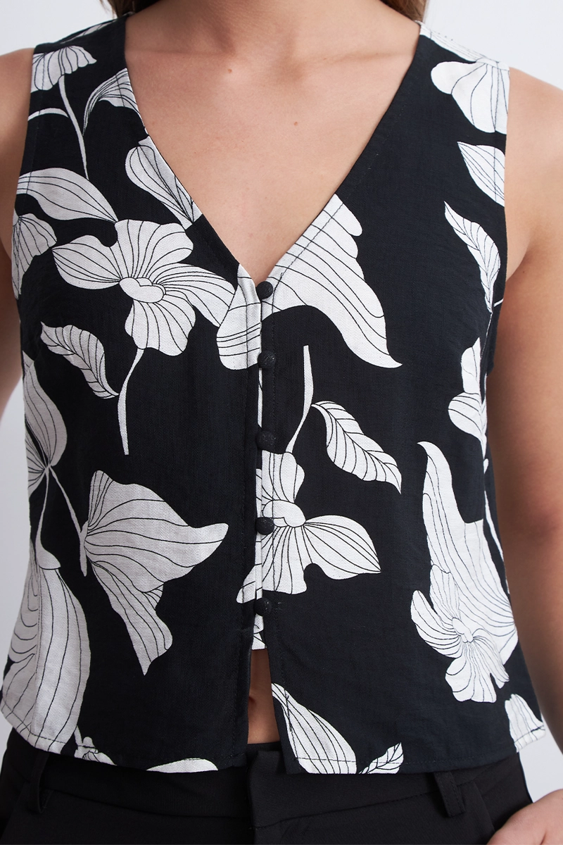 BLUSA SIN MANGAS NEGRA CON FLORES BLANCAS MUJER NICOPOLY - 6