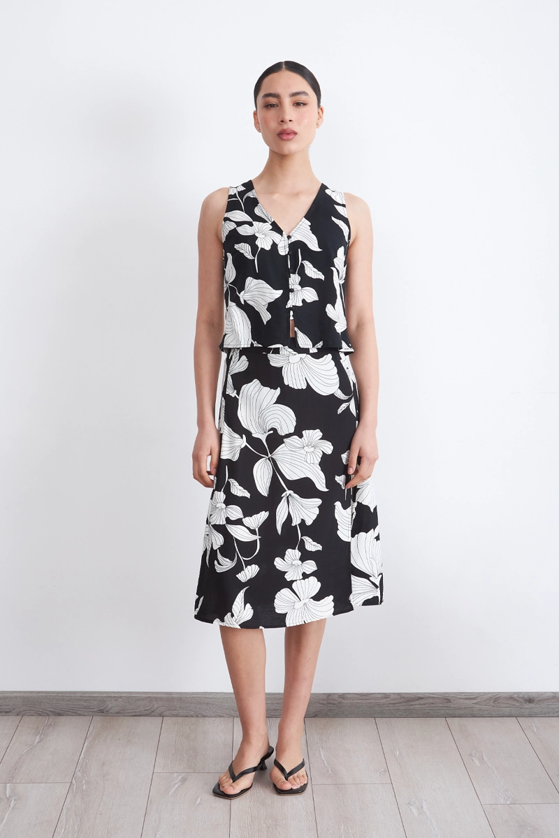 FALDA MIDI NEGRA CON FLORES BLANCAS MUJER NICOPOLY - 2
