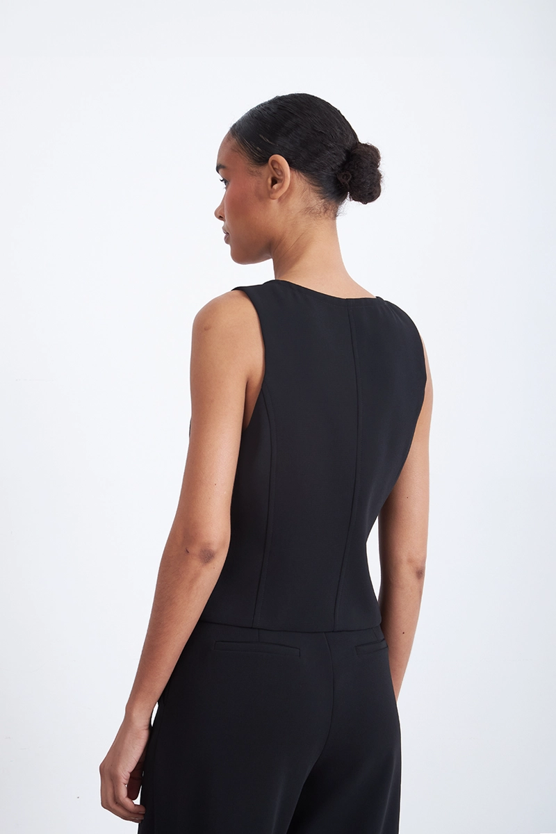 GILET ESCOTE EN V PROFUNDO NEGRO MUJER NICOPOLY - 4