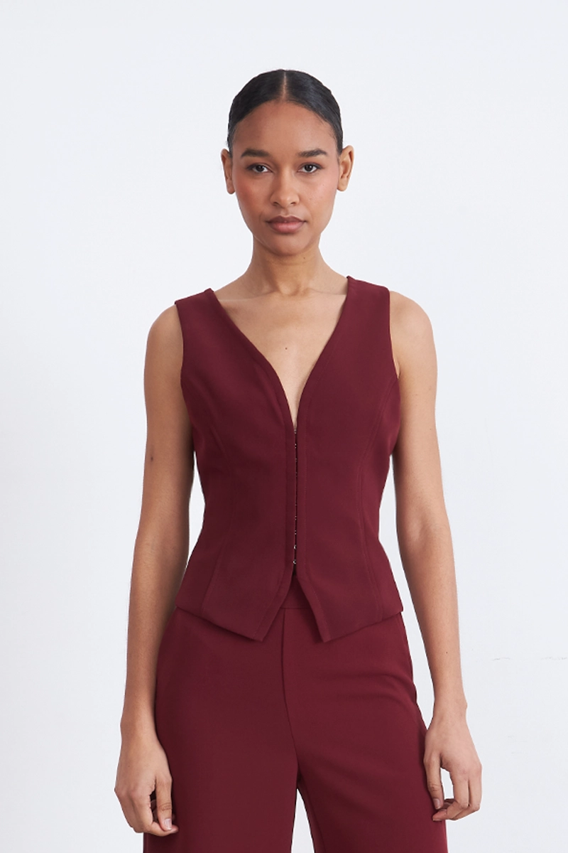 GILET ESCOTE EN V PROFUNDO BURDEO MUJER NICOPOLY - 1