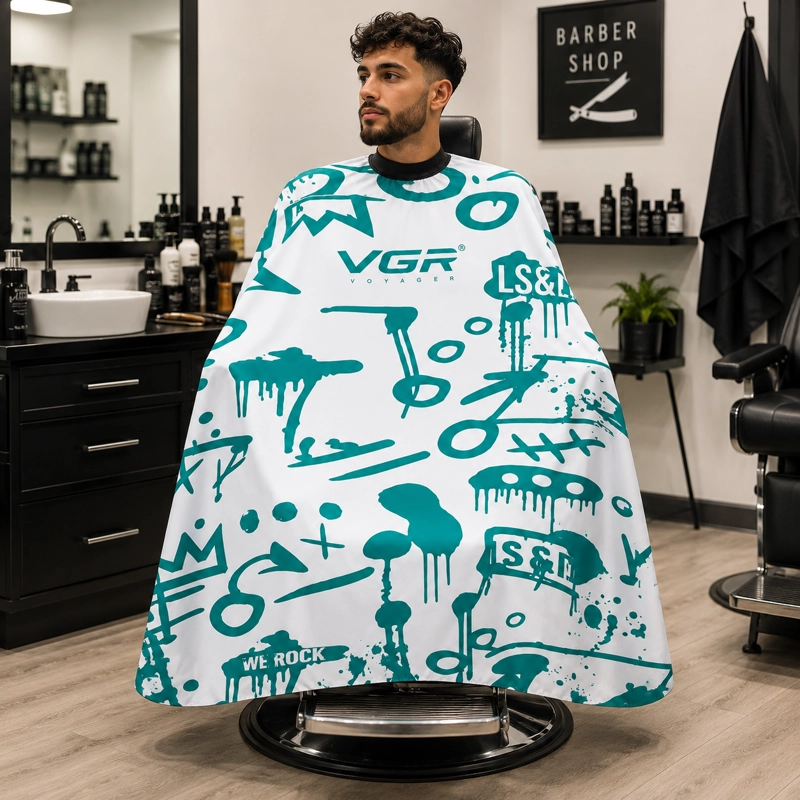 CAPA DE BARBERIA VGR BLANCA CON CUELLO DE GOMA ANTIPELUSA. - 2