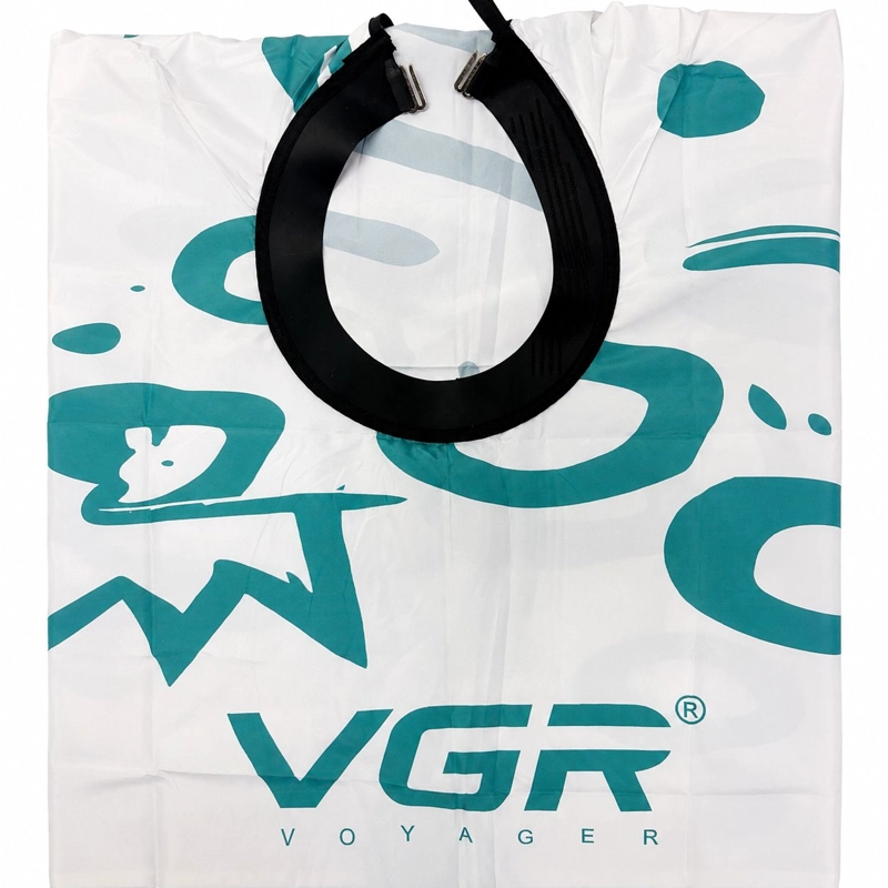CAPA DE BARBERIA VGR BLANCA CON CUELLO DE GOMA ANTIPELUSA. - 3