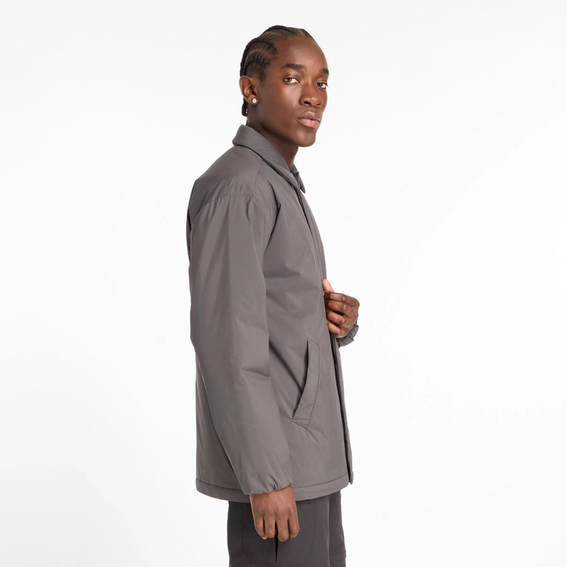 CHAQUETA LIFESTYLE HOMBRE NEW BALANCE COACHES JACKET GRIS - 7