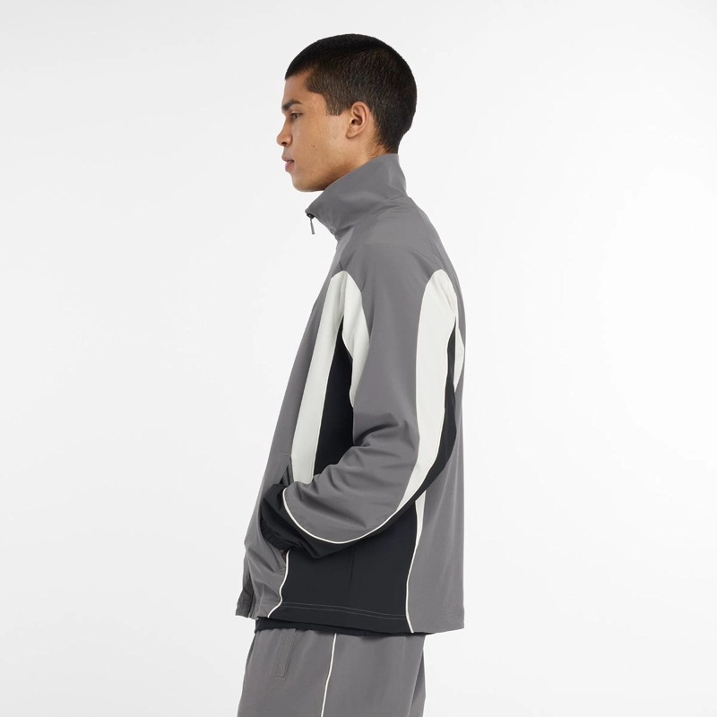 CHAQUETA LIFESTYLE HOMBRE NEW BALANCE IN GAME WOVEN GRIS - 3