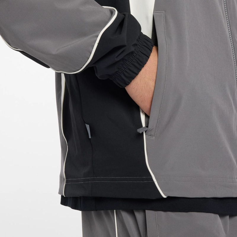 CHAQUETA LIFESTYLE HOMBRE NEW BALANCE IN GAME WOVEN GRIS - 6