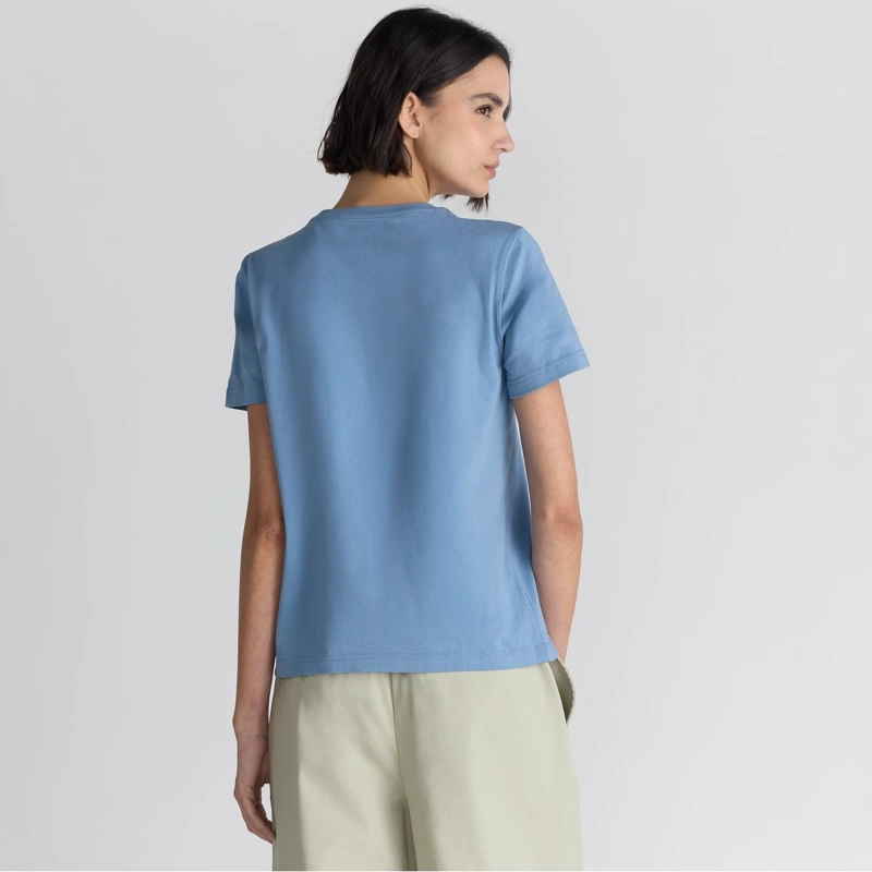 POLERA LIFESTYLE MUJER NEW BALANCE SPORT ESSENTIALS CELESTE - 2
