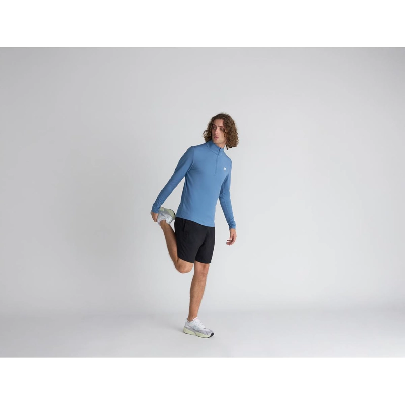 POLERON HOMBRE NEW BALANCE SPACE DYE 1/4 CELESTE - 5