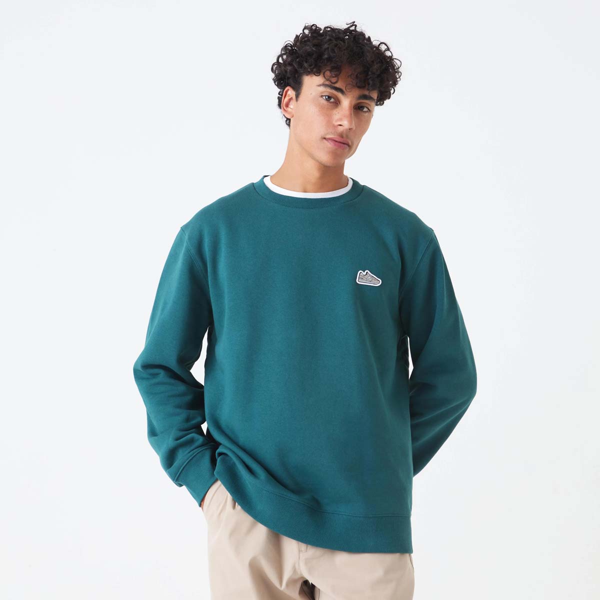NEW BALANCE POLERON HOMBRE NEW BALANCE SPORT ESSENTIALS FLECE CREW VERDE