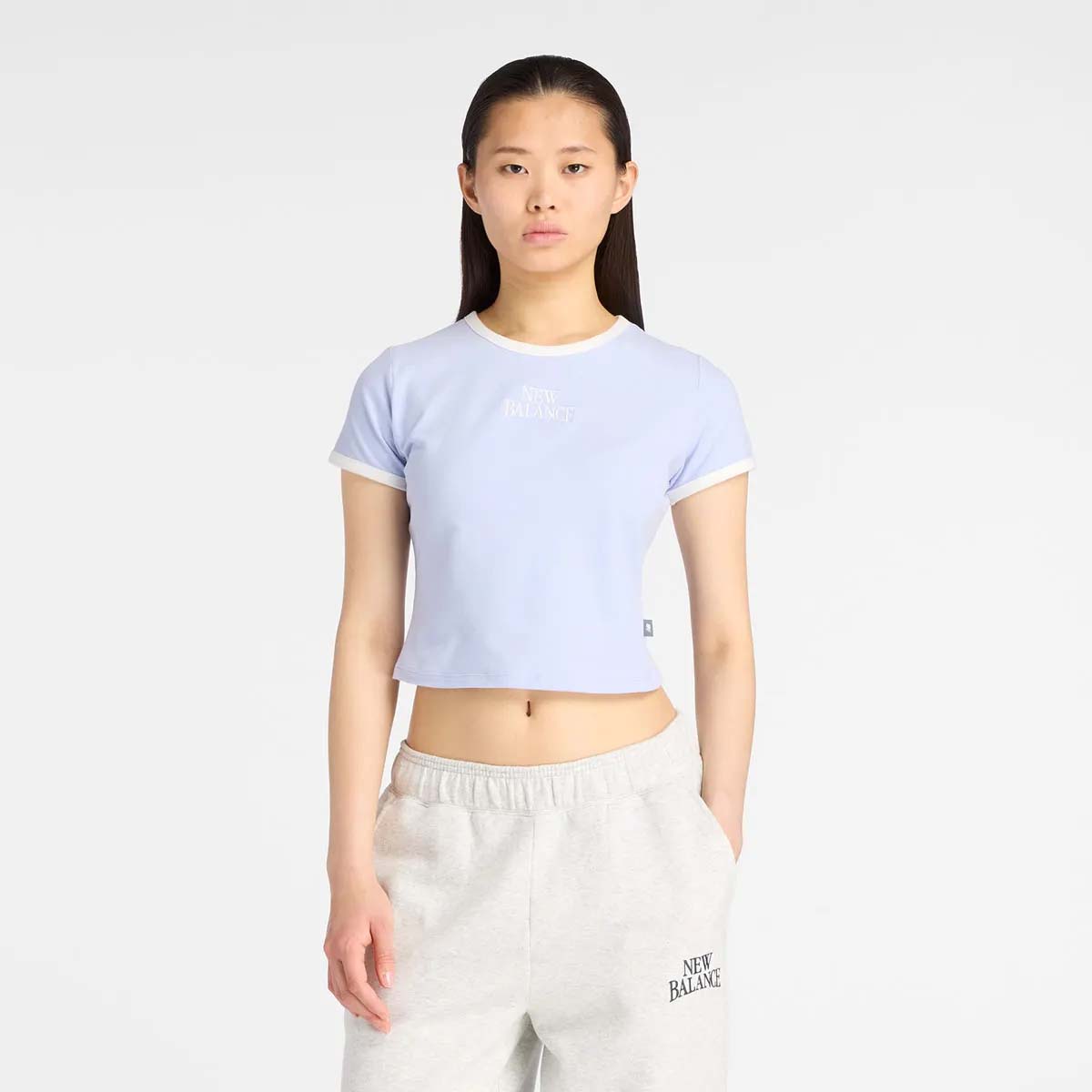NEW BALANCE POLERA LIFESTYLE MUJER NEW BALANCE TRACKSIDE RINGER T-SHIRT