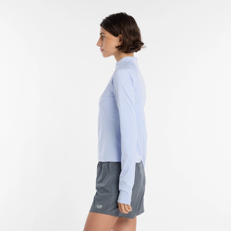POLERON RUNNING MUJER NEW BALANCE HARMONY FITTED CELESTE - 6