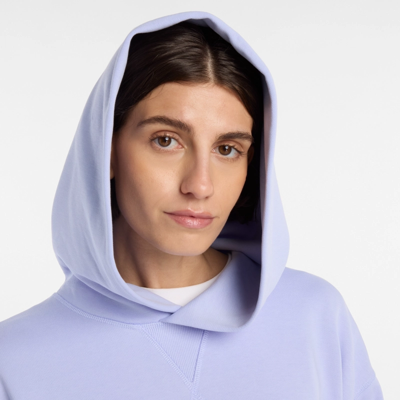 POLERON LIFESTYLE MUJER NEW BALANCE FLEECE HOODIE CELESTE - 7