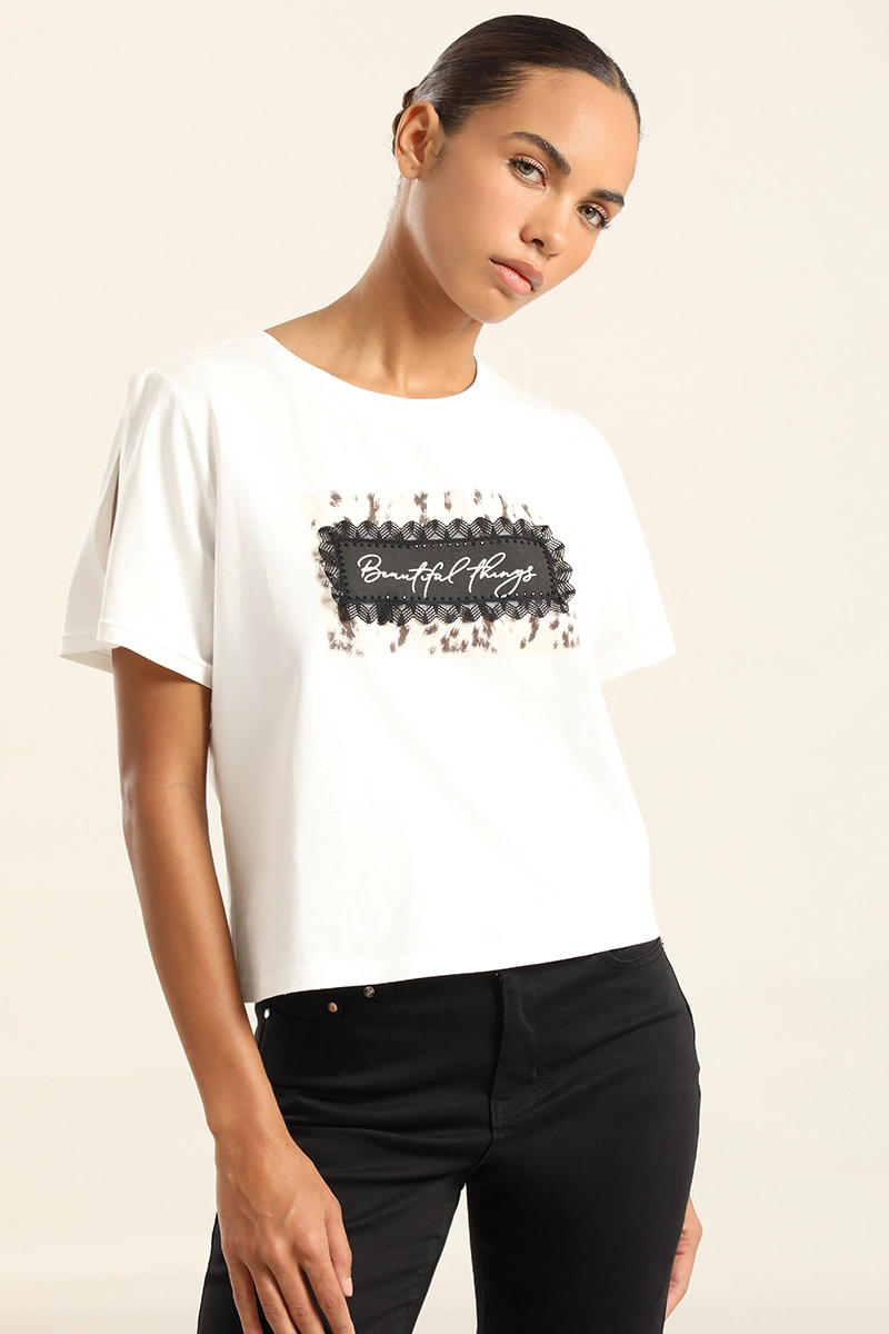 POLERA CON APLICACION, CRUDO LIOLA - 1