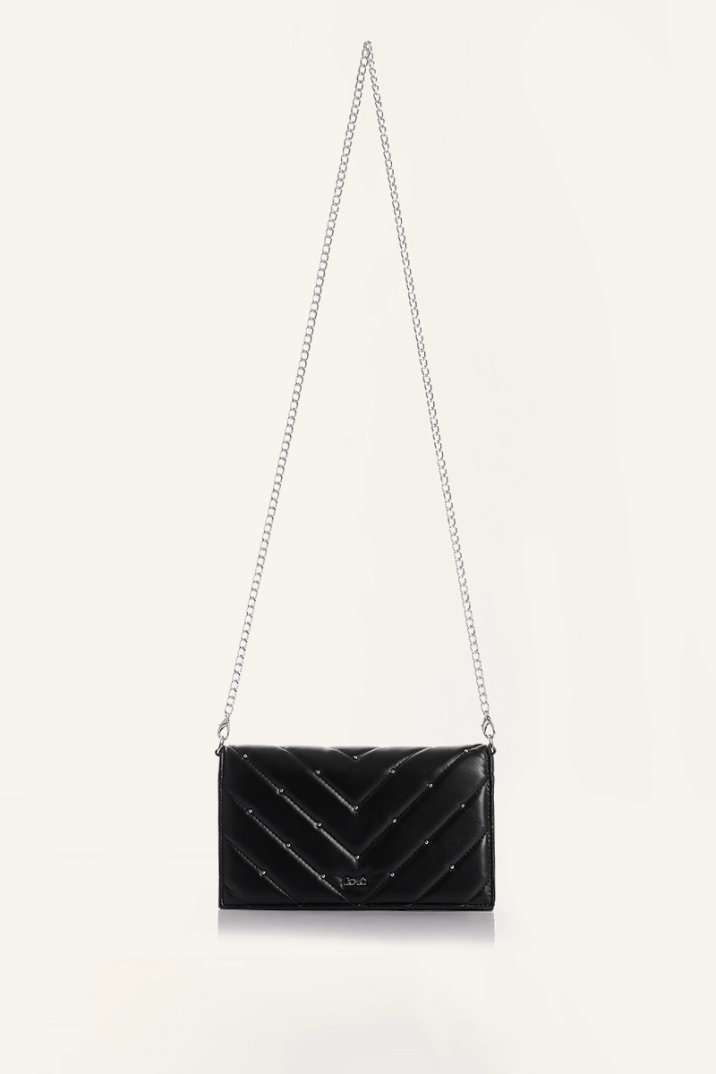 SOBRE TACHAS SIMIL CUERO NEGRO LIOLA - 4