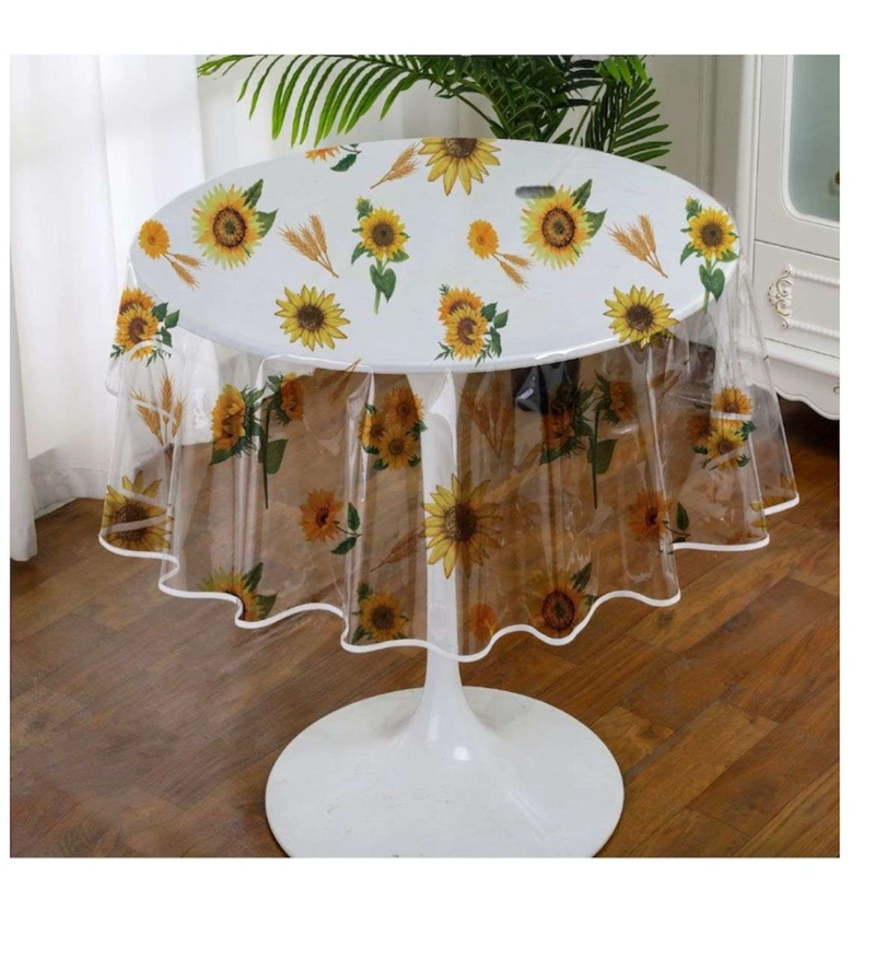 MANTEL DE HULE PLASTICO REDONDO TRANSPARENTE DISEÑOS - 1