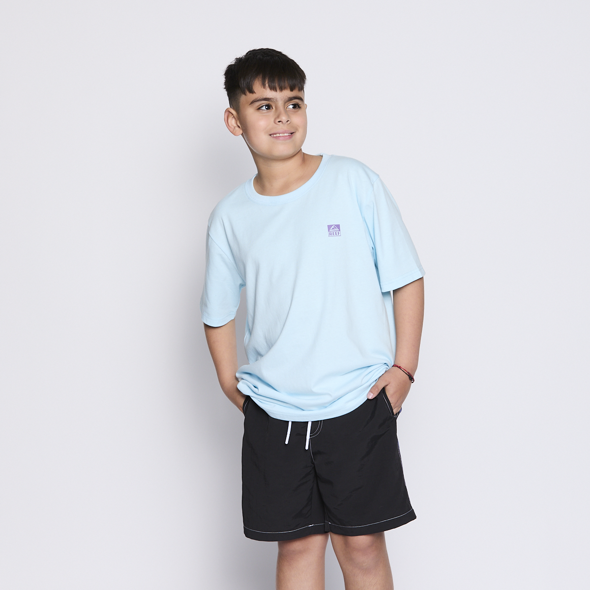 POLERA REEF KIDS LIGHT BLUE LOGO BACK - 4