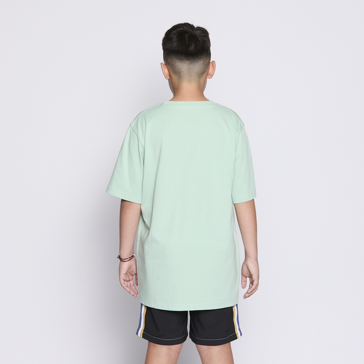 POLERA REEF KIDS LIGHT GREEN PRINT FRONT - 3