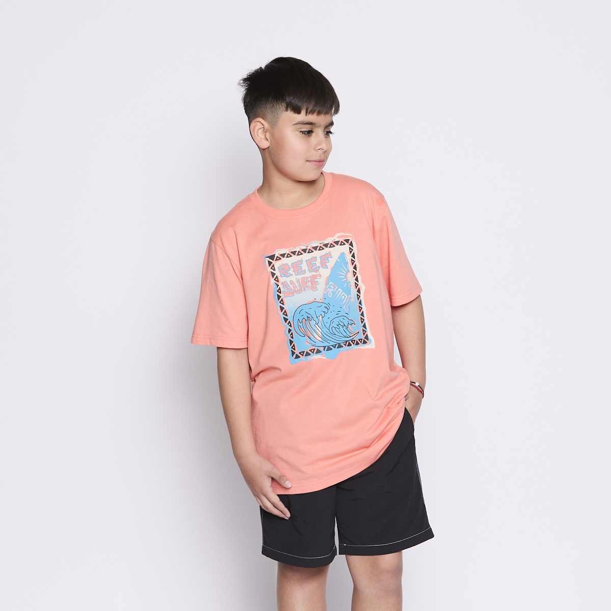 POLERA REEF KIDS ORANGE PRINT FRONT - 4