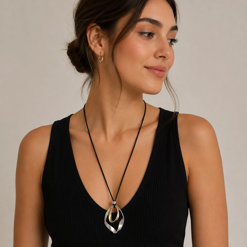 COLLAR LARGO CON DIJE ABSTRACTO PLATEADO 36 CM MUJER - 1