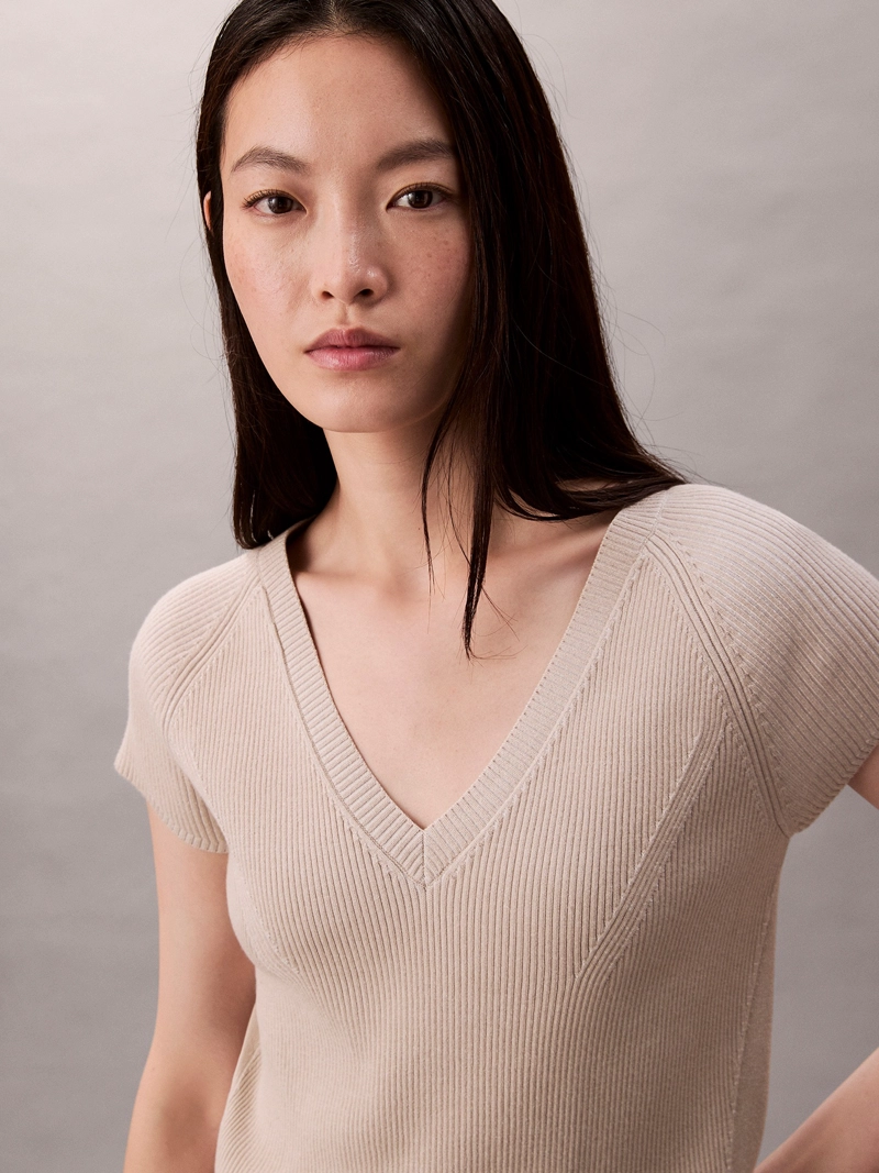SWEATER SIN MANGAS JASPEADO - 5