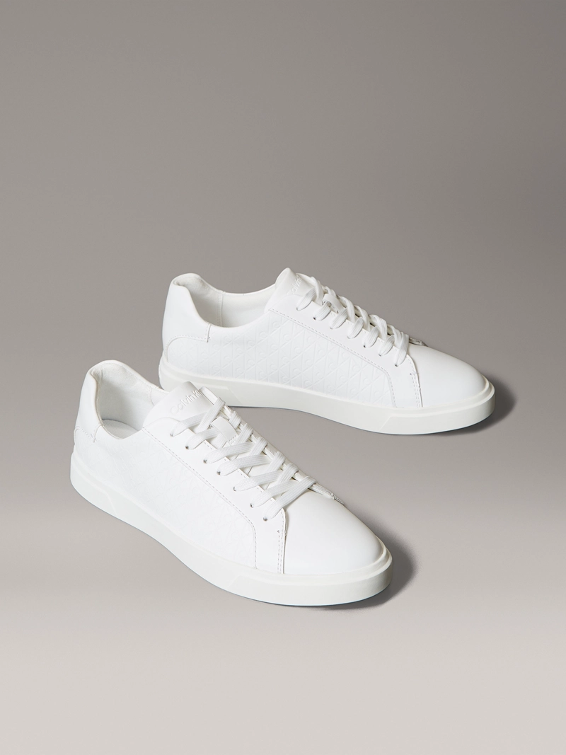 ZAPATILLAS CON MONOGRAMA EN RELIEVE - 1