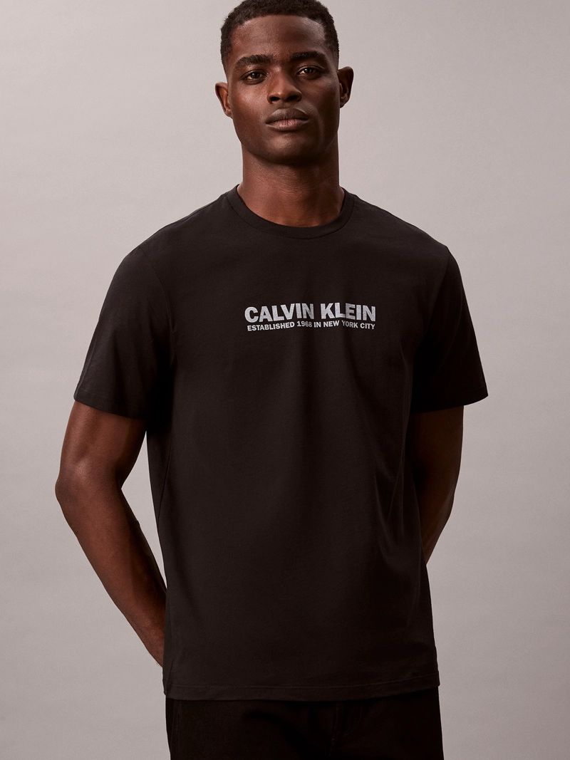POLERA CON ESTAMPADO DE LOGO - 4