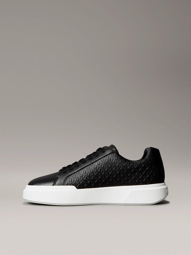 ZAPATILLAS CON MONOGRAMA EN RELIEVE INTEGRAL - 6