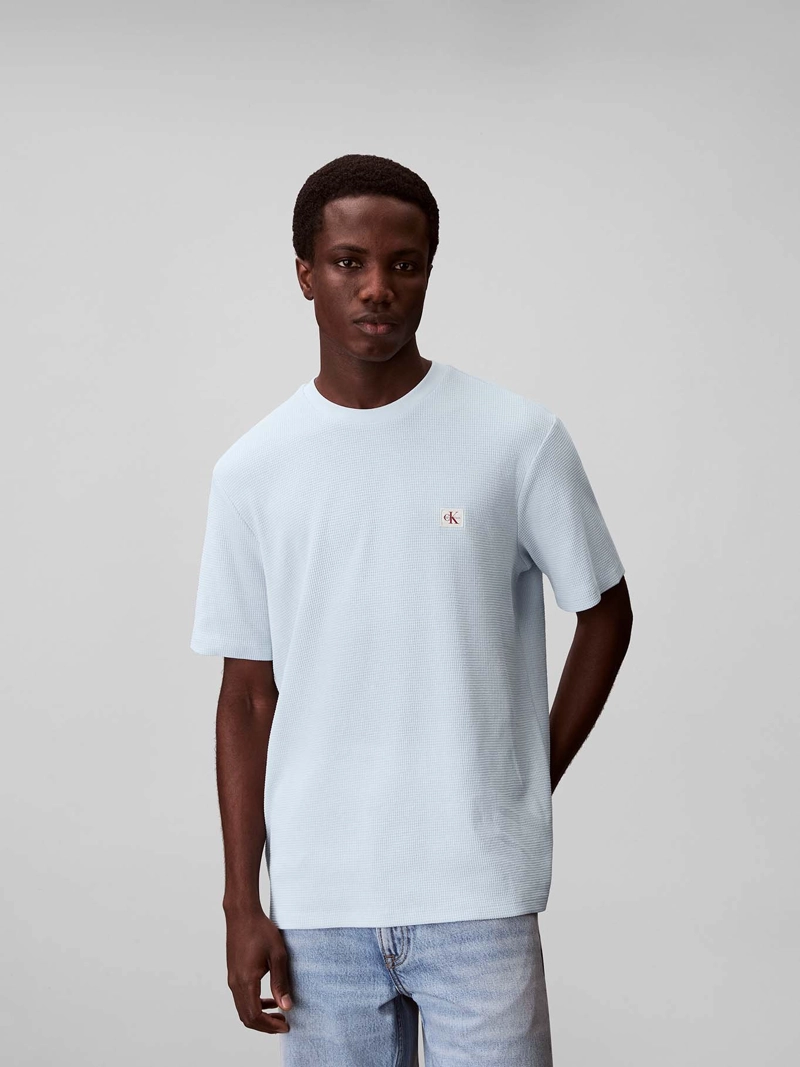 POLERA EN TEJIDO WAFFLE CON ETIQUETA DE LOGO - 1