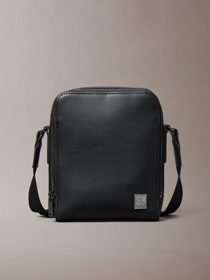 BOLSO REPORTER CON EMBLEMA METALICO - 1