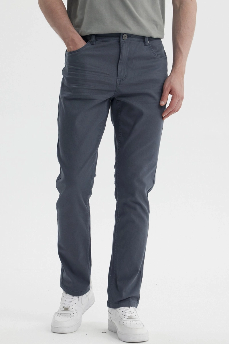 JEANS HOMBRE SLIM COLOR PETROLEO - 1
