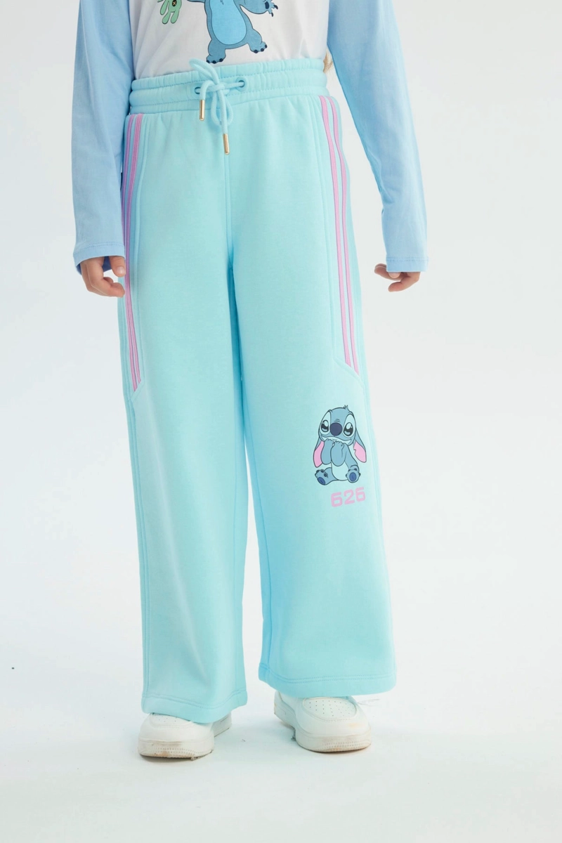 PANTALON BUZO NIÑA LILO & STITCH CELESTE - 1